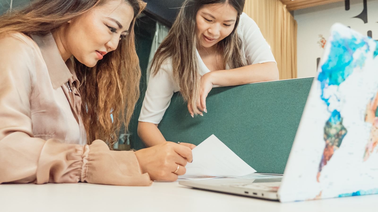Professional team reviewing case documents together in an office